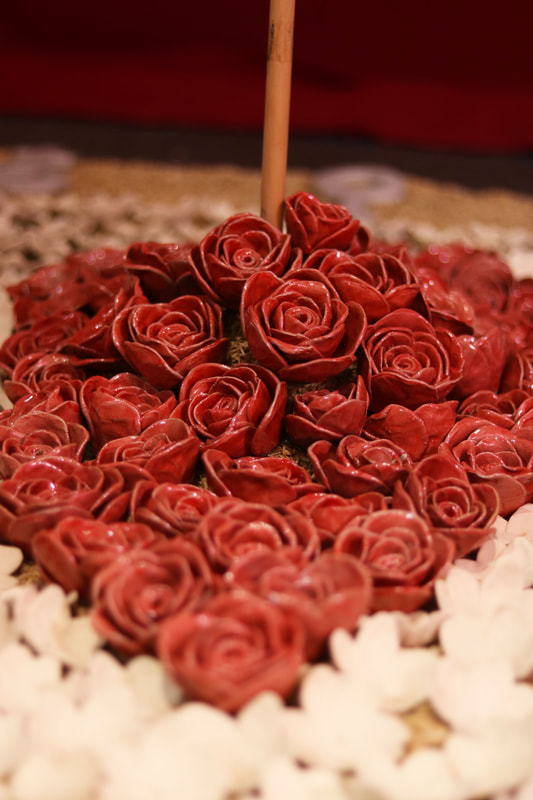 Red Roses symbolize love, passion, courage, dignity, and beauty, then  White Jasmine, symbolize sacred, holy and pure. 

